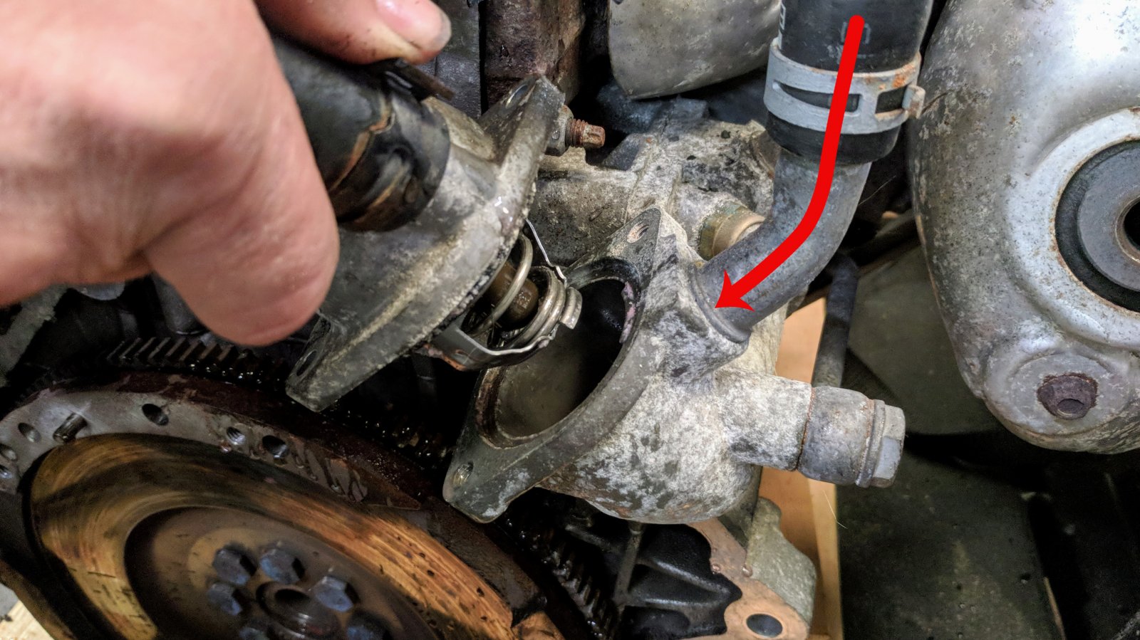 heater tube to thermostat flow arrow.jpg