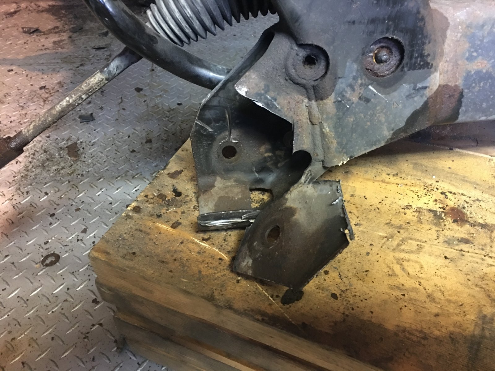 Rear control arm bolt removal