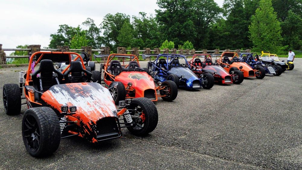 Lineup of DF Goblin V1 cars at a meet, wide group shot in Arkansas