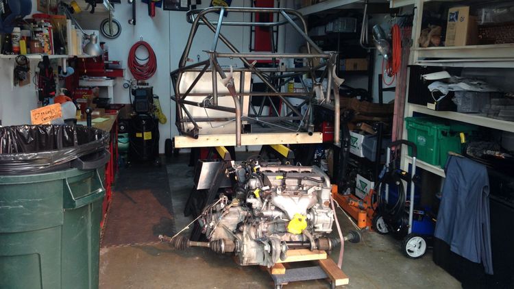 Carl's stage 1 Goblin kit rests on saw horses over his donor powertrain.