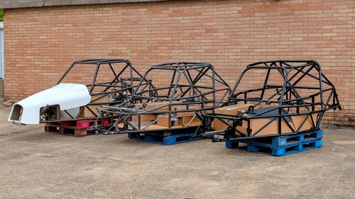 Three Goblin kits staged side by side before pickup, with V1-553 on the left, V2-004 in the middle, and V2-002 on the right.